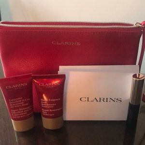 Mini traveling size *CLARINS* with pouch